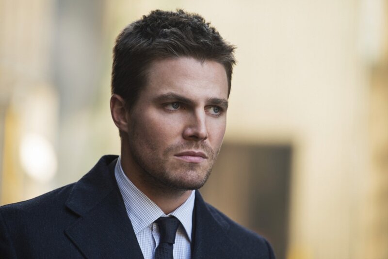 Man in Suit Looking Away — Black, Serious