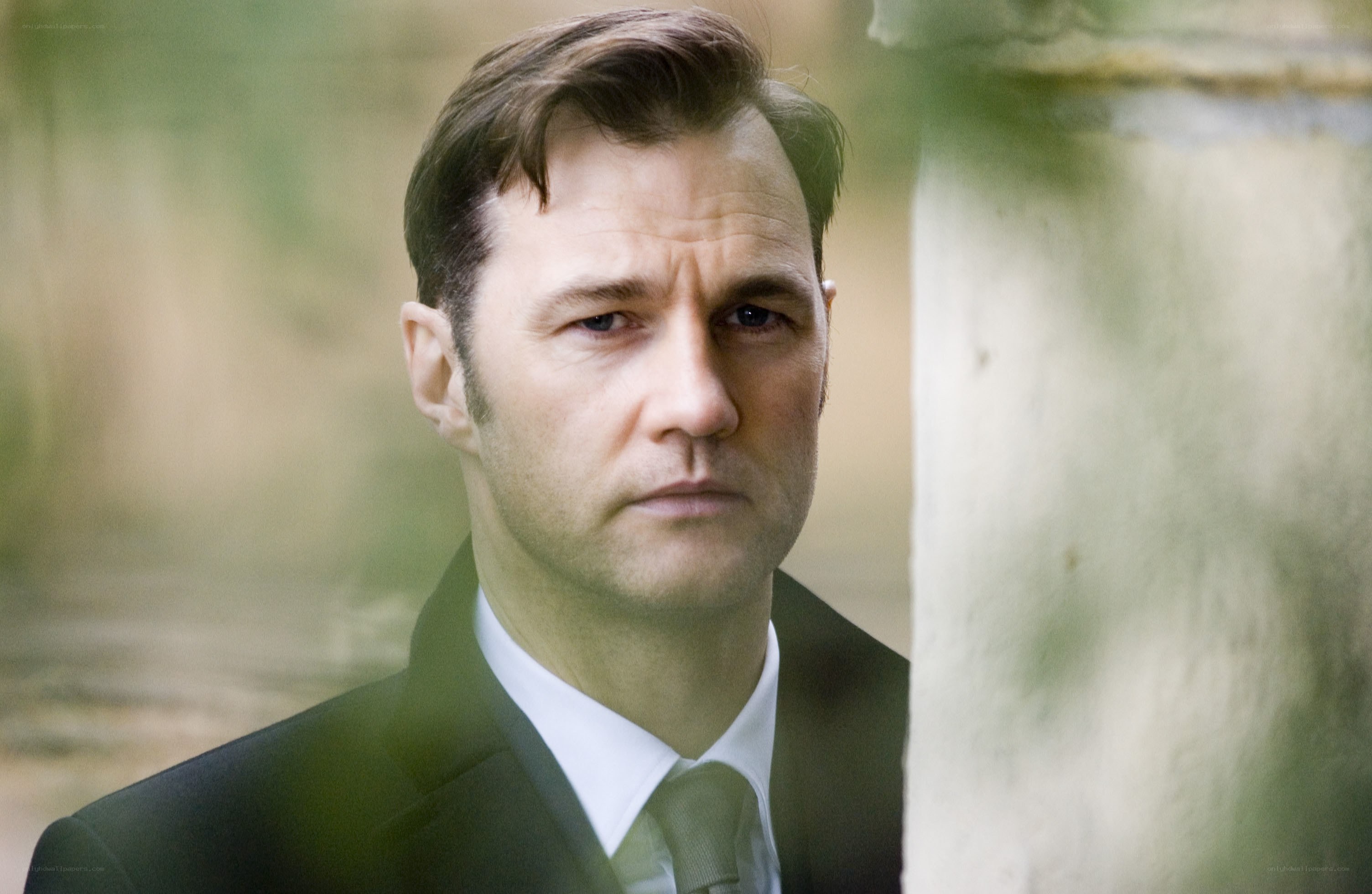 man in suit looking serious
