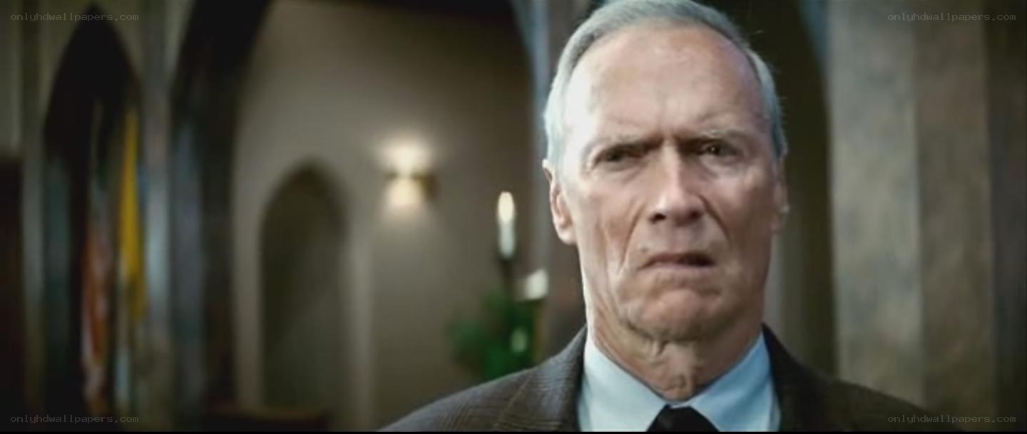 man in suit looking serious