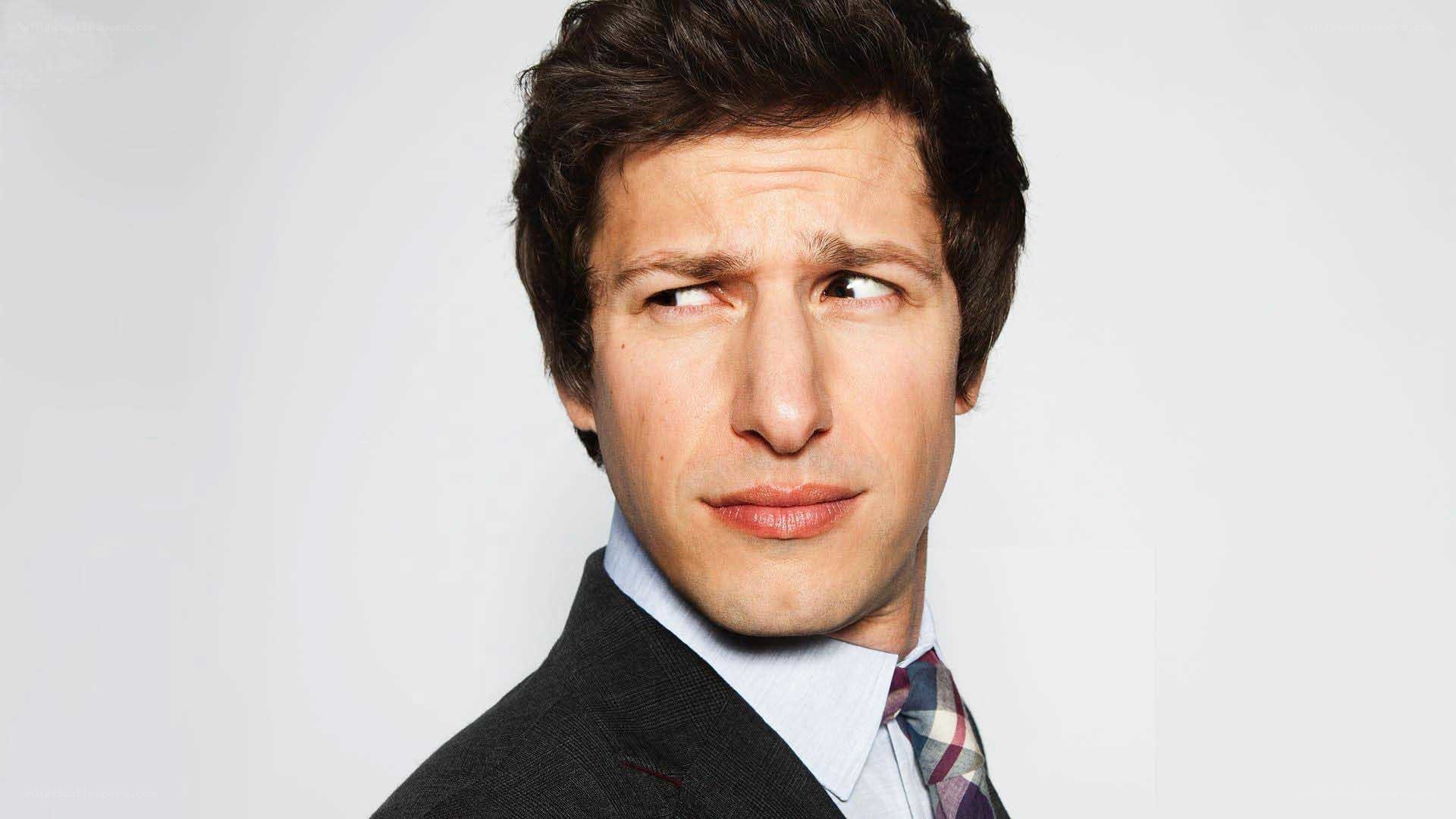 man in suit making funny face