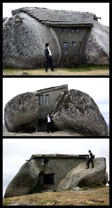 Man in suit near rock house