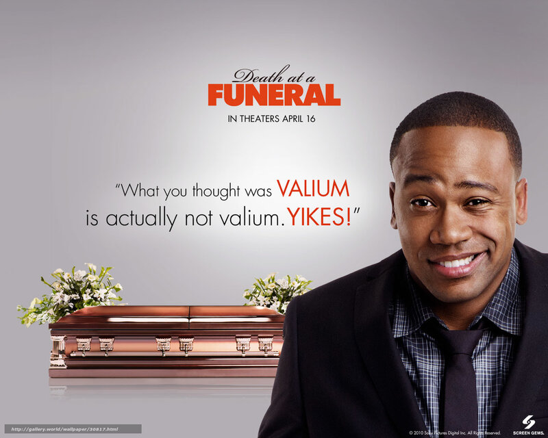 Man in Suit Next to Casket