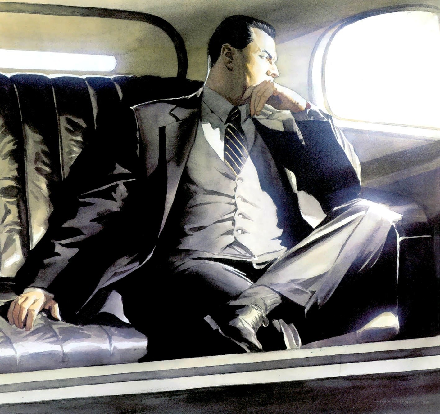 Man in suit on airplane