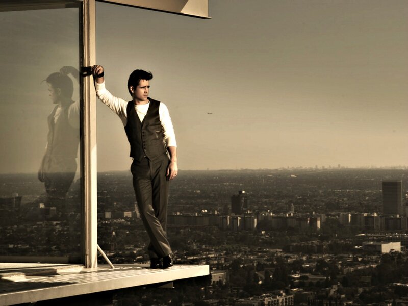 Man in Suit on Balcony — Sepia