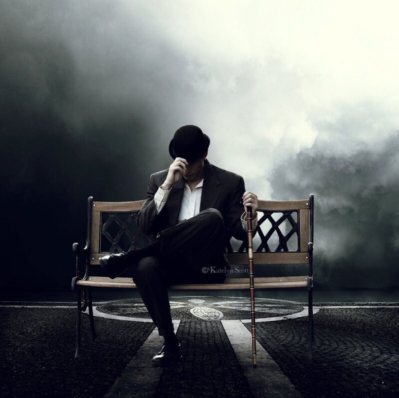 Man in Suit on Bench — Black, Dramatic