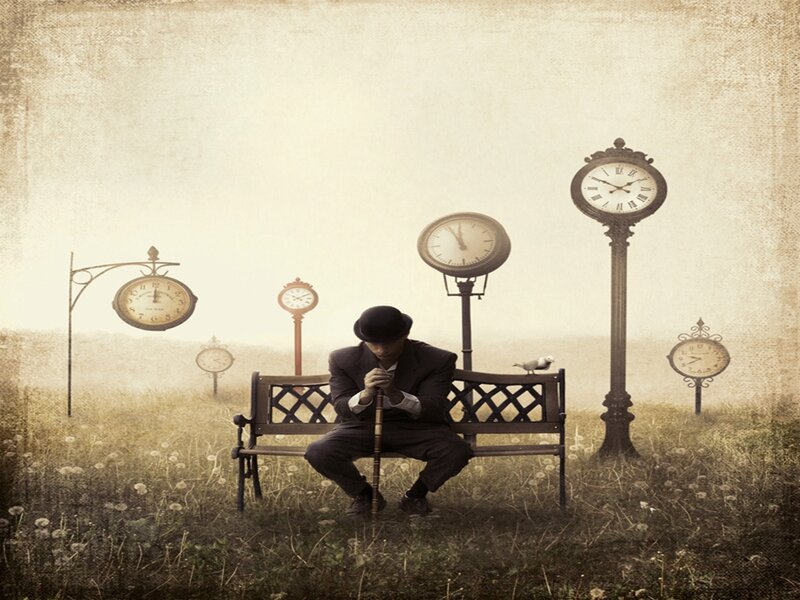 Man in Suit on Bench — Sepia