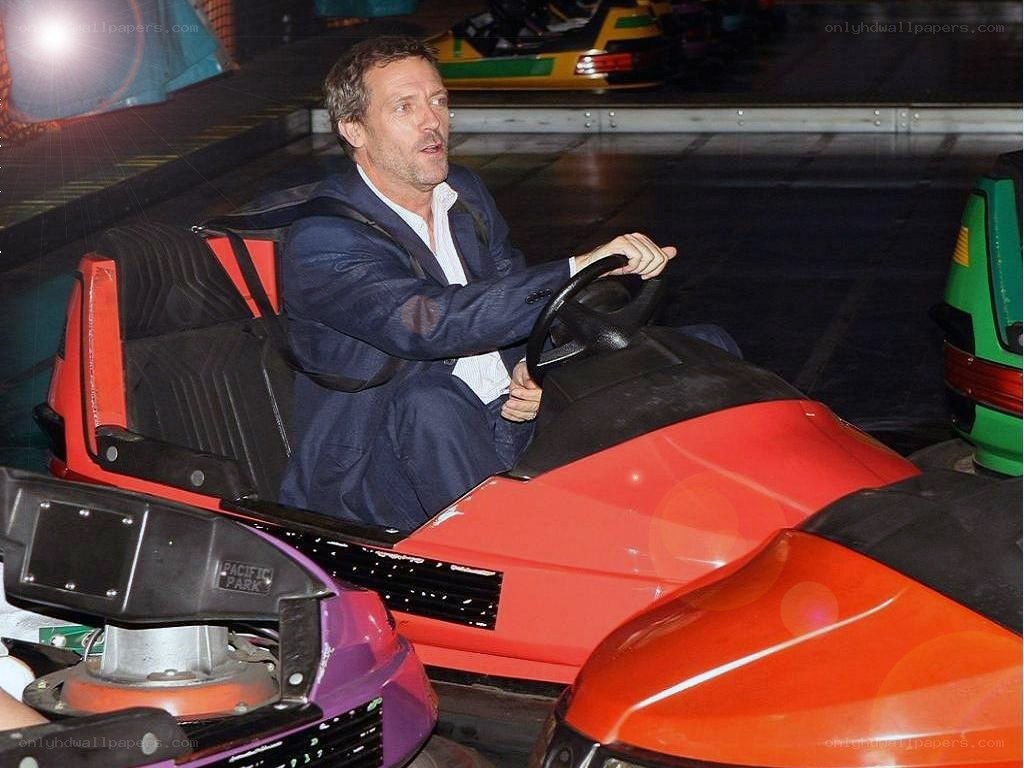man in suit on bumper car