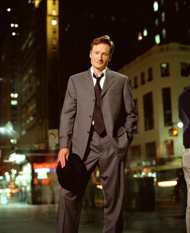 Man in suit on city street