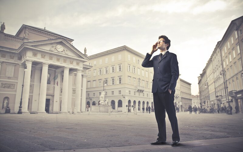 Man in suit on city street