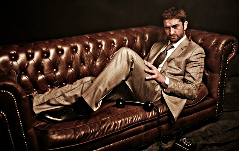 Man in Suit on Couch — Brown