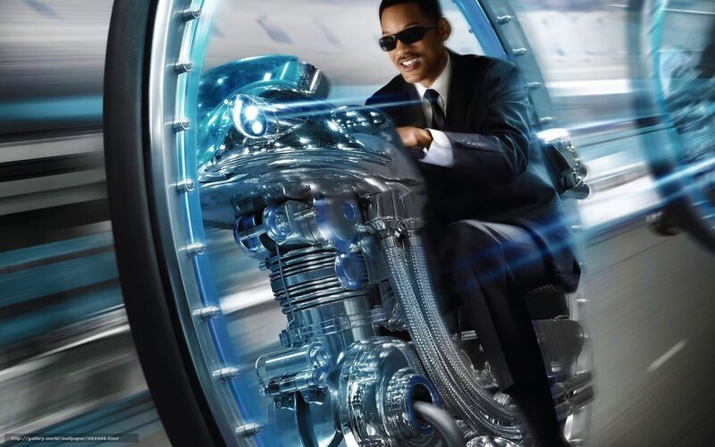 man in suit on futuristic motorcycle