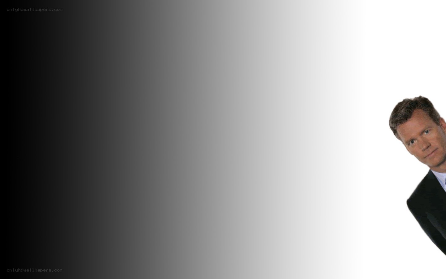 man in suit on gradient background