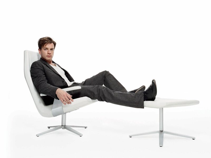 Man in suit on modern chair