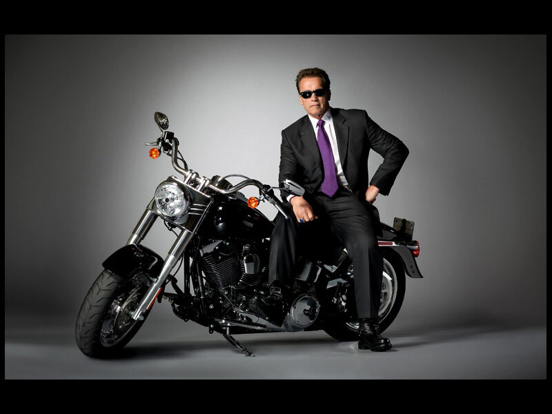 Man in Suit on Motorcycle — Black