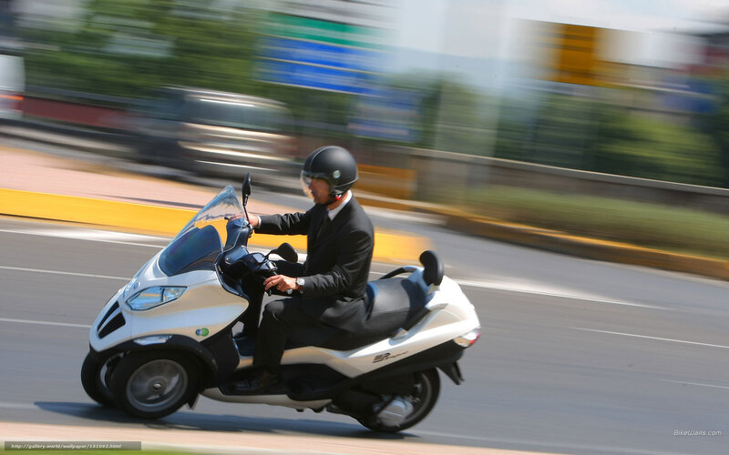 Man in Suit on Scooter — White, Dynamic