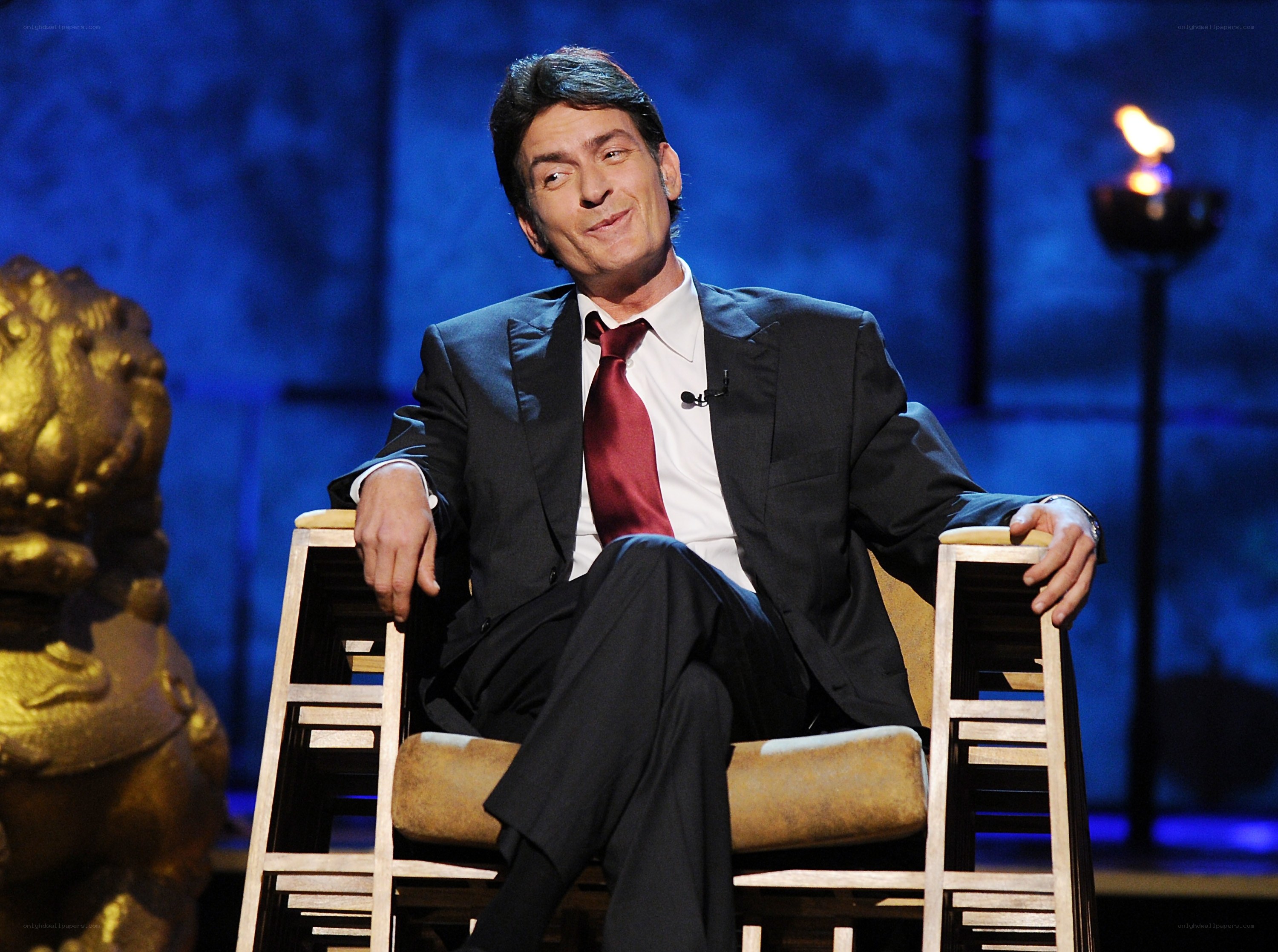 Man in suit on stage