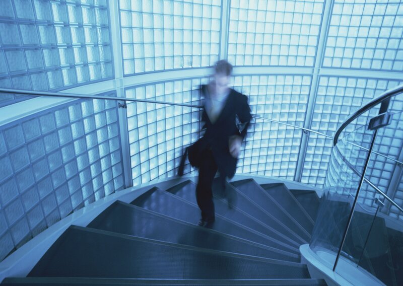 Man in Suit on Stairs — Blue