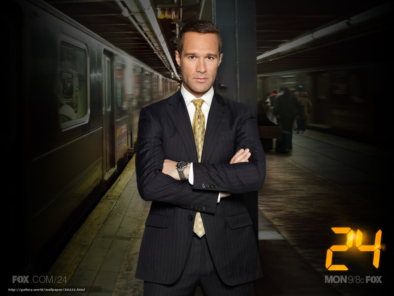 Man in Suit on Subway Platform