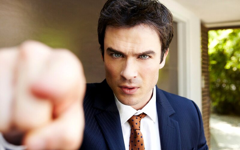 Man in Suit Pointing — Blue, Intense