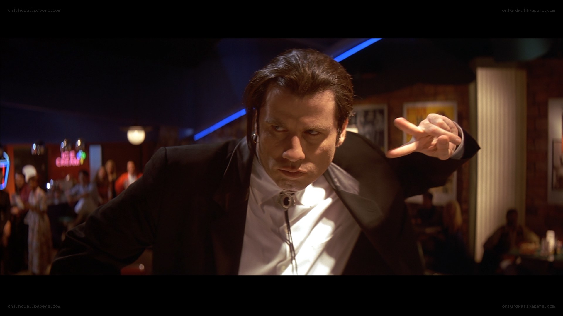 man in suit pointing finger