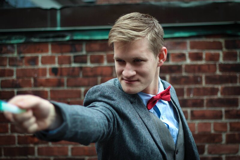 man in suit pointing