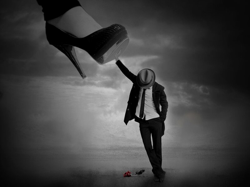 Man in Suit Reaching Up