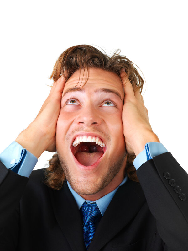 man in suit screaming