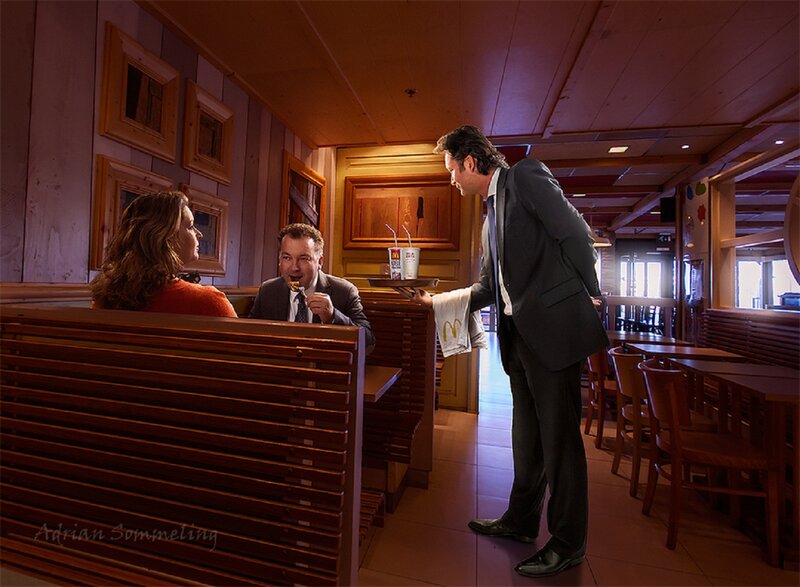 Man in Suit Serving Food