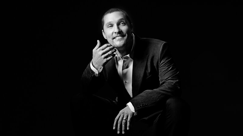 Man in Suit Sitting — Black, Dramatic, Photograph, Hand