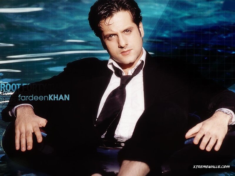 Man in Suit Sitting — Black, Dramatic