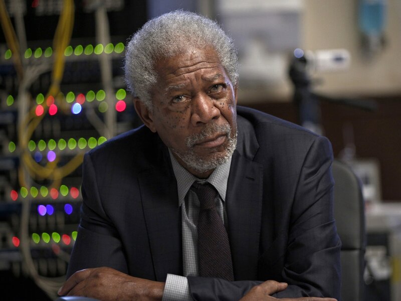 Man in Suit Sitting — Black, Serious, Photograph, Server Rack