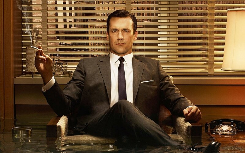 Man in Suit Sitting — Brown, Serious, Photograph, Cigar