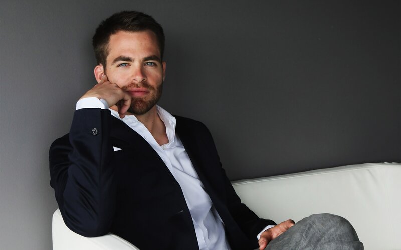Man in Suit Sitting — Gray, Calm