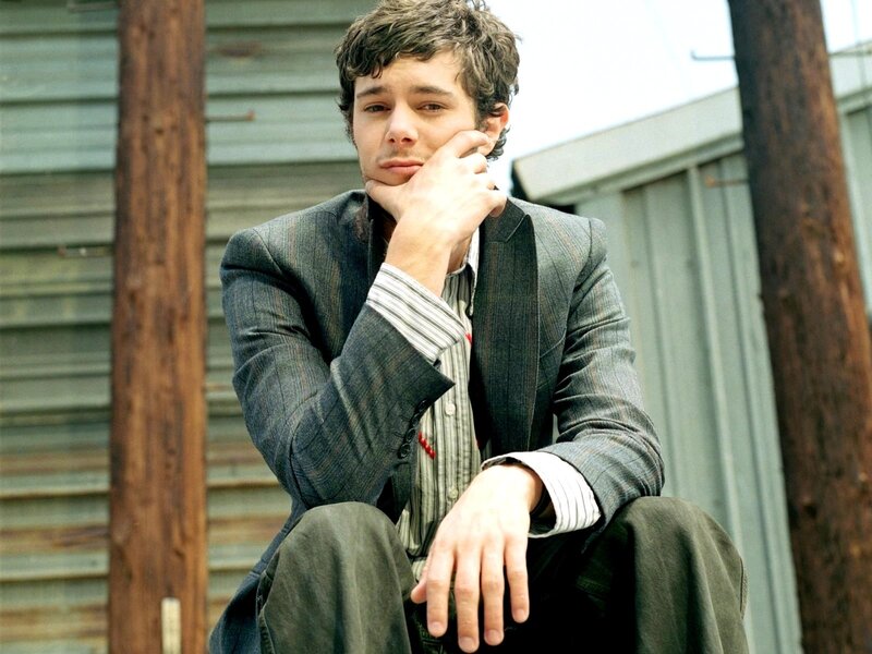 Man in Suit Sitting — Gray, Contemplative