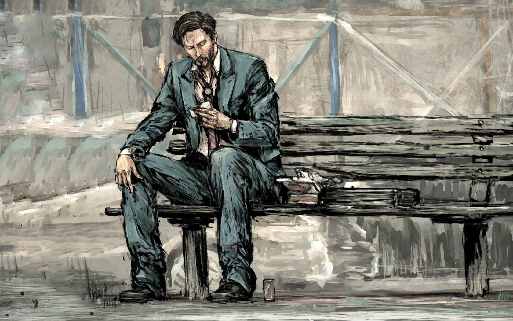 man in suit sitting on bench