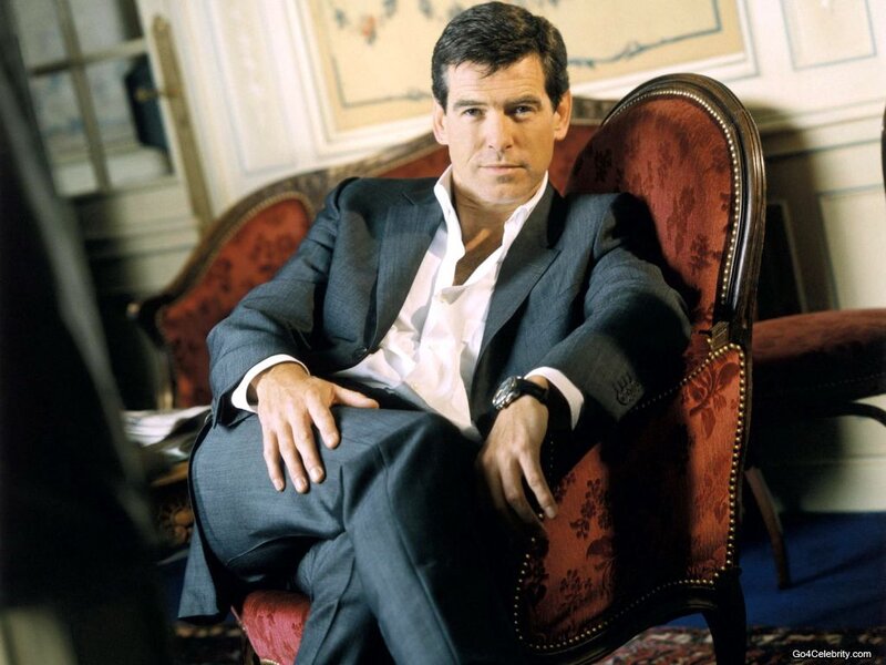 Man in Suit Sitting — Red