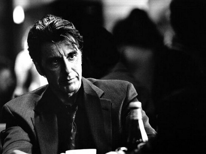 Man in Suit Sitting