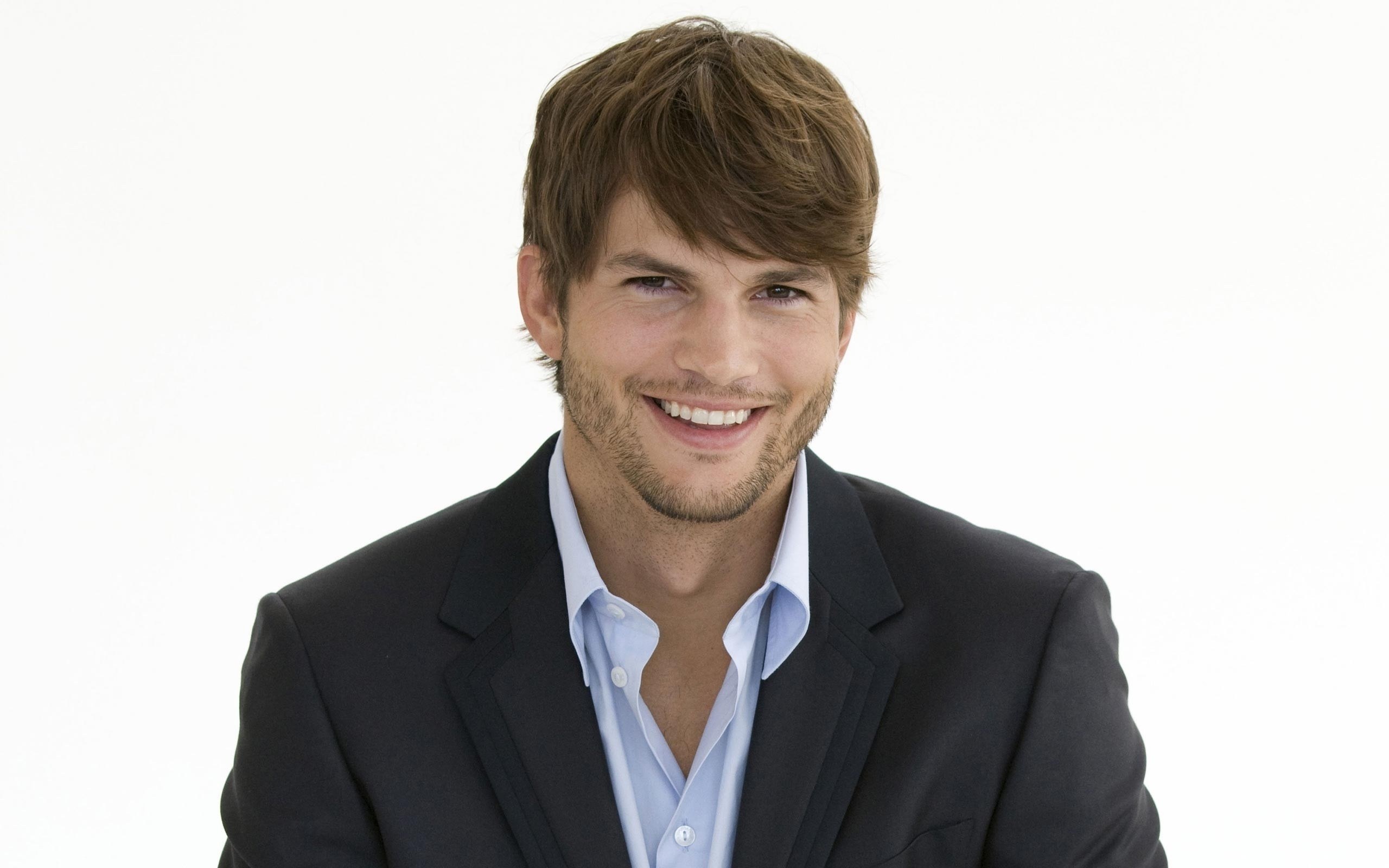 man in suit smiling