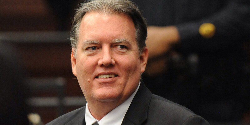 man in suit smiling