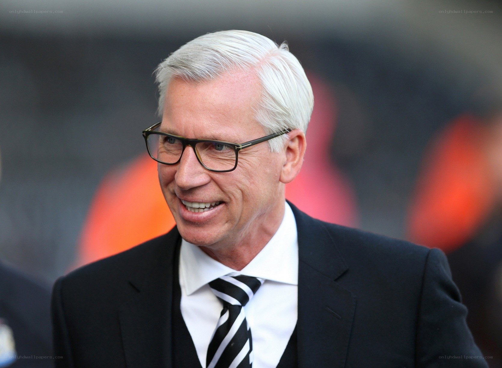 man in suit smiling