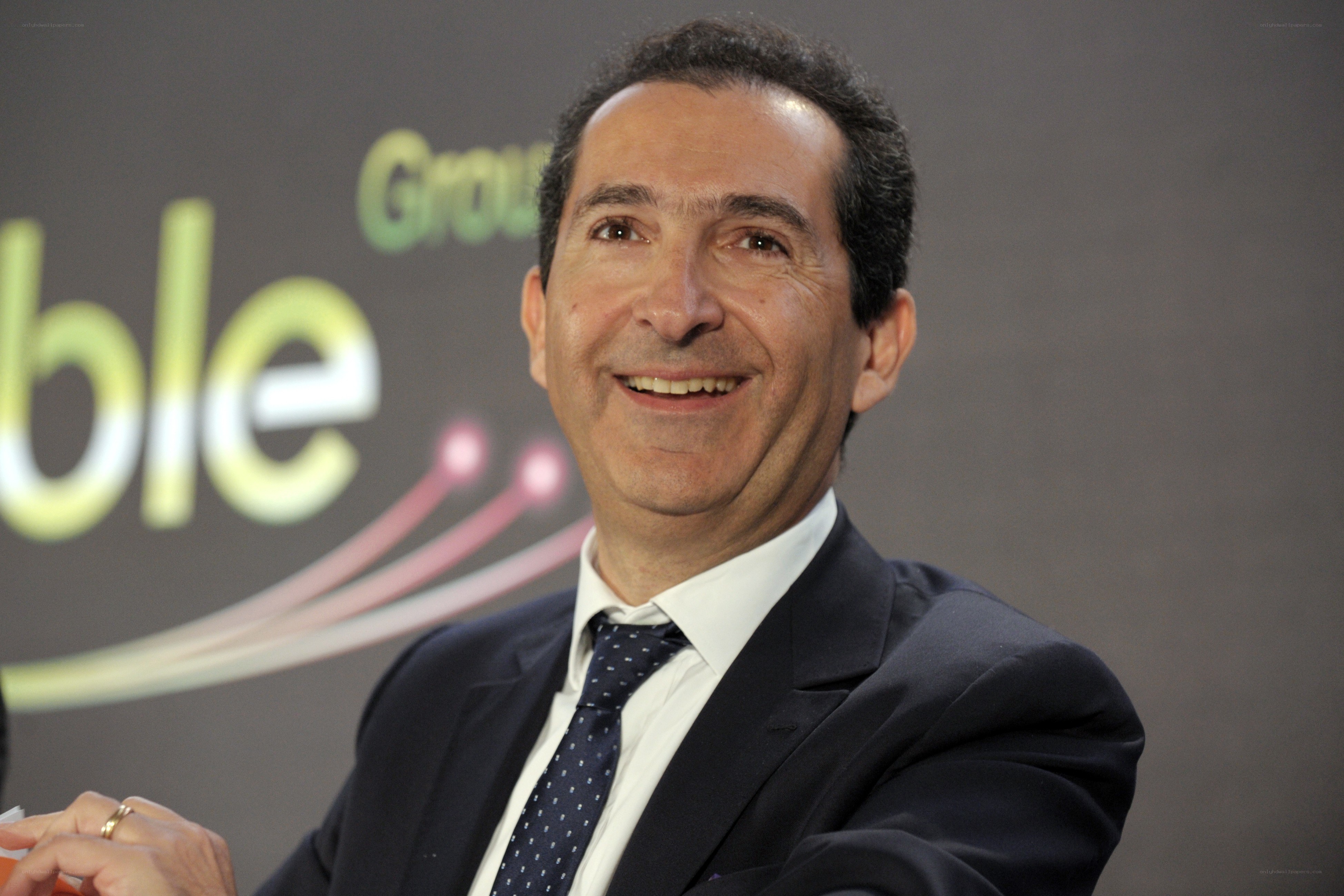 man in suit smiling