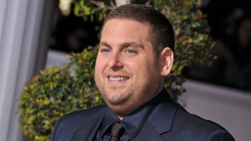 man in suit smiling