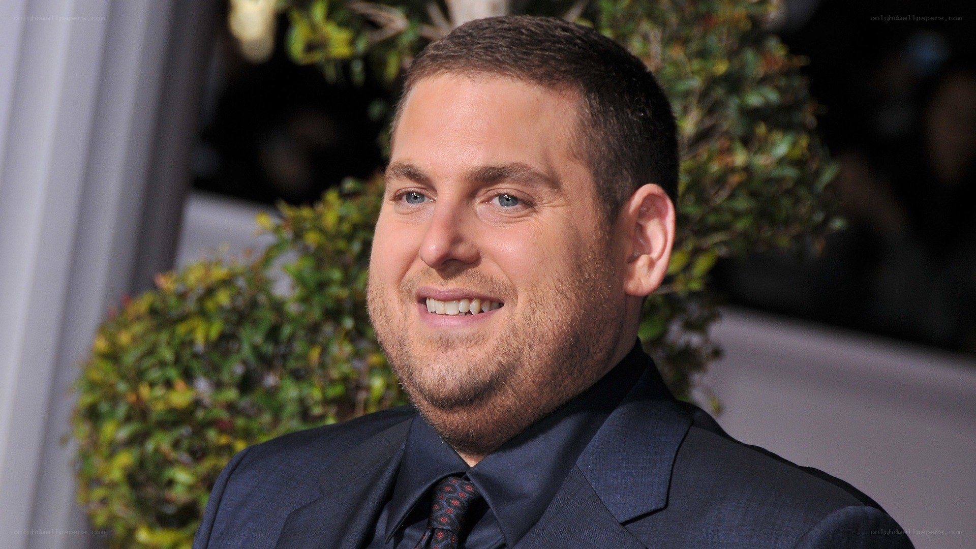 man in suit smiling