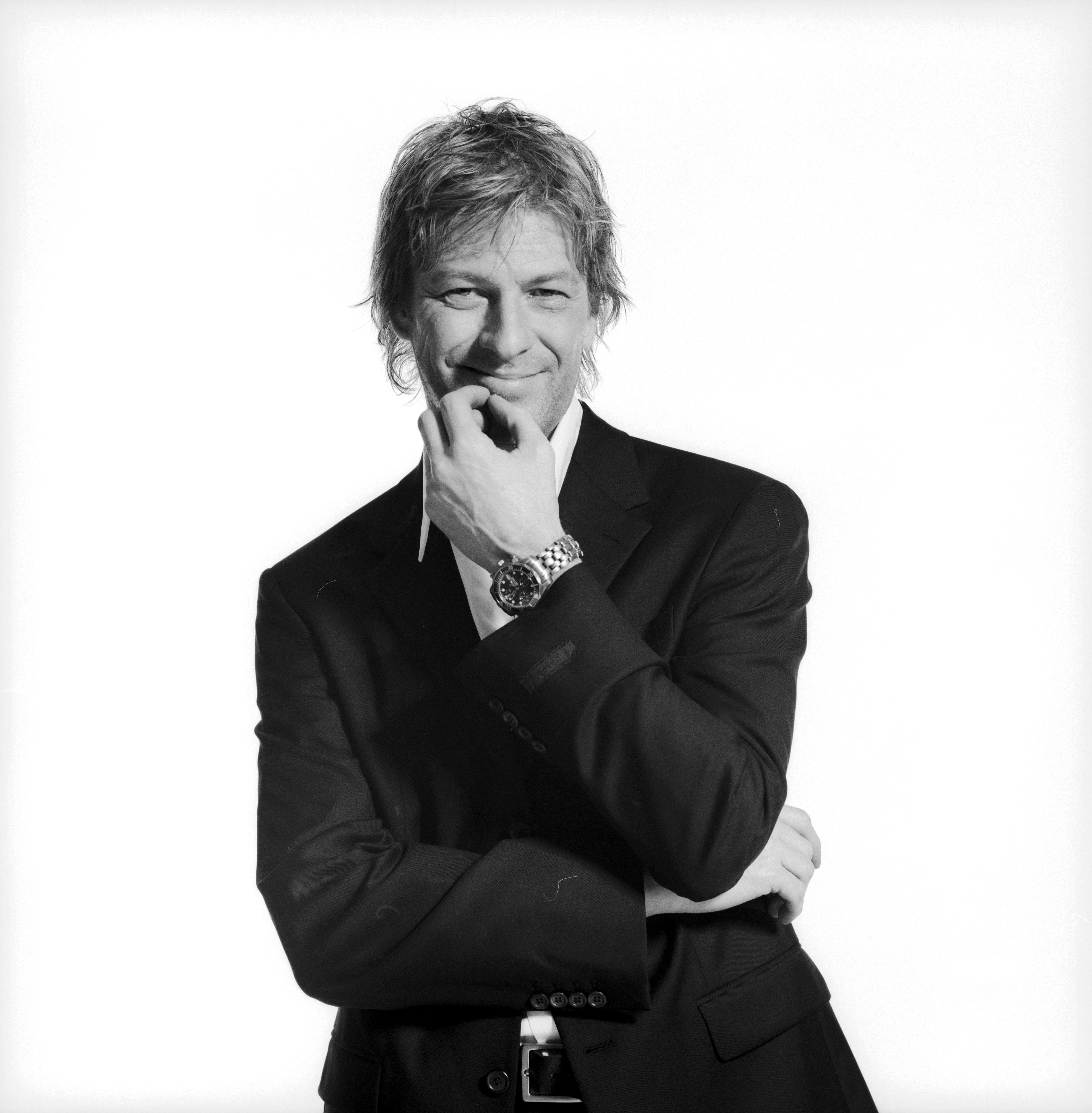 man in suit smiling