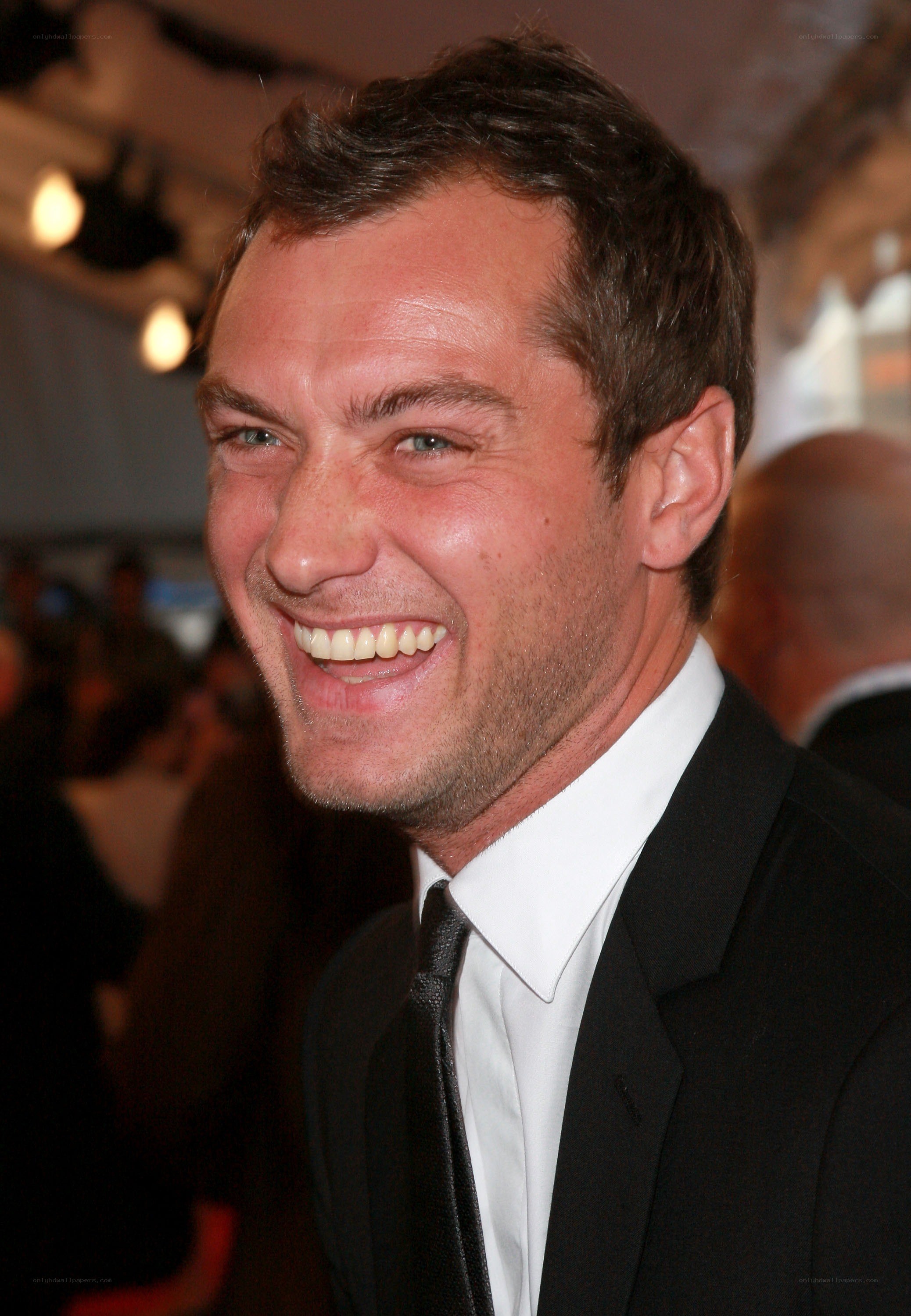 man in suit smiling
