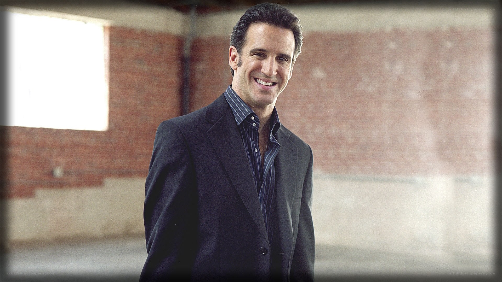 man in suit smiling