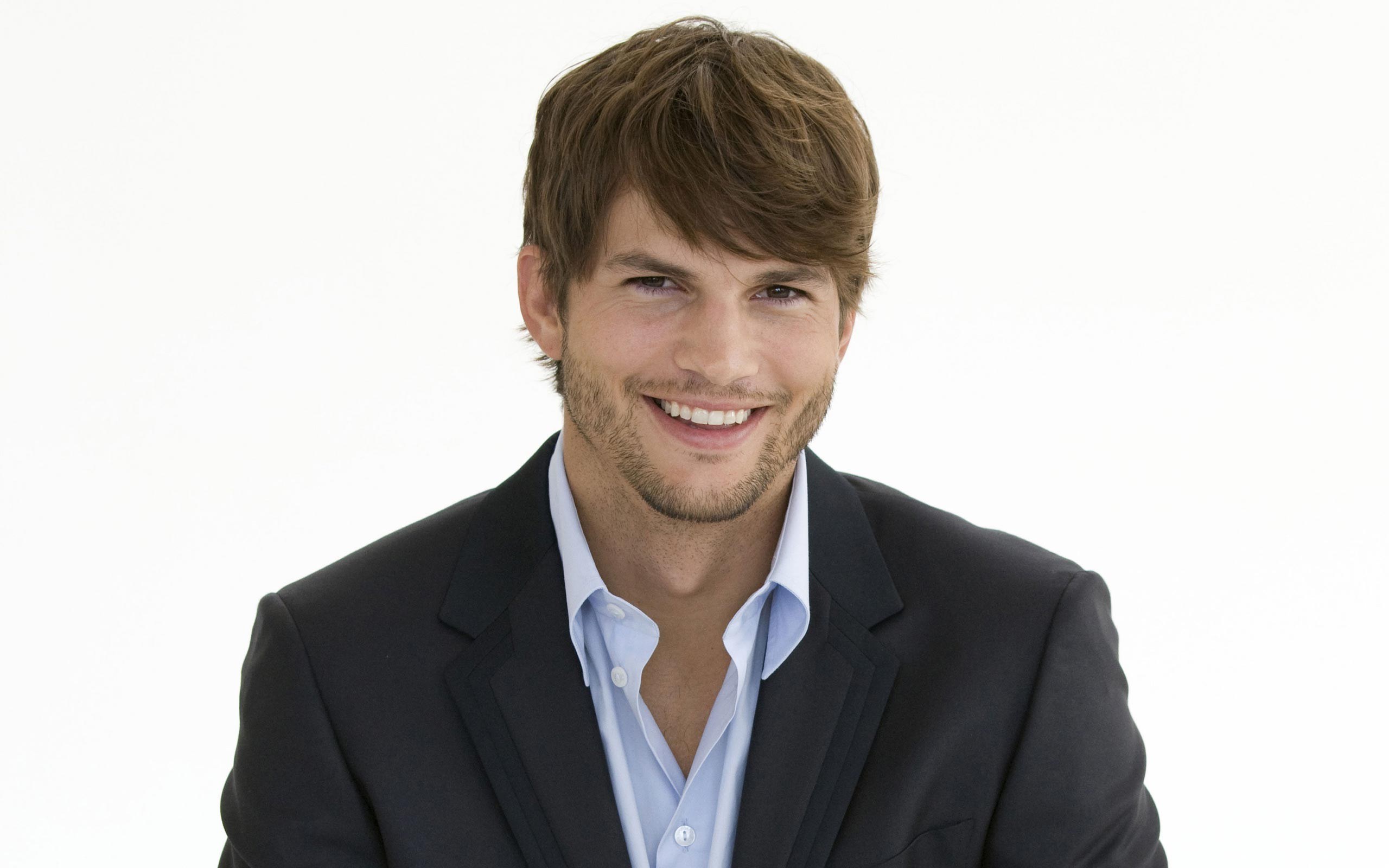 man in suit smiling