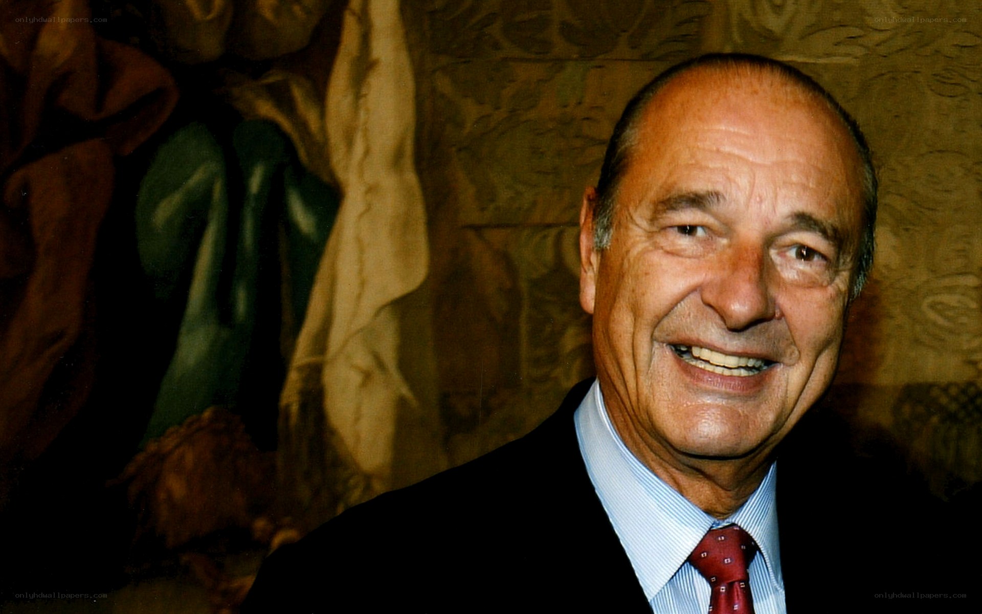 Man in suit smiling