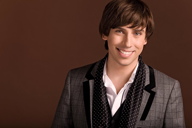 Man in Suit Smiling — Brown, Friendly
