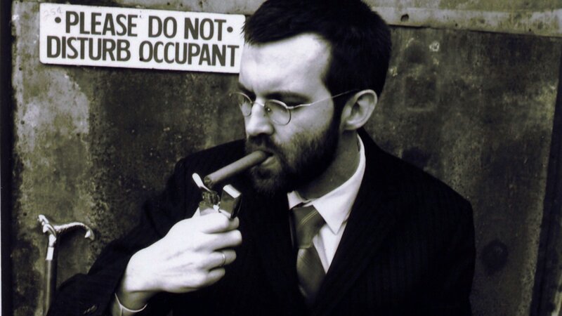 Man in Suit Smoking Cigar — Black